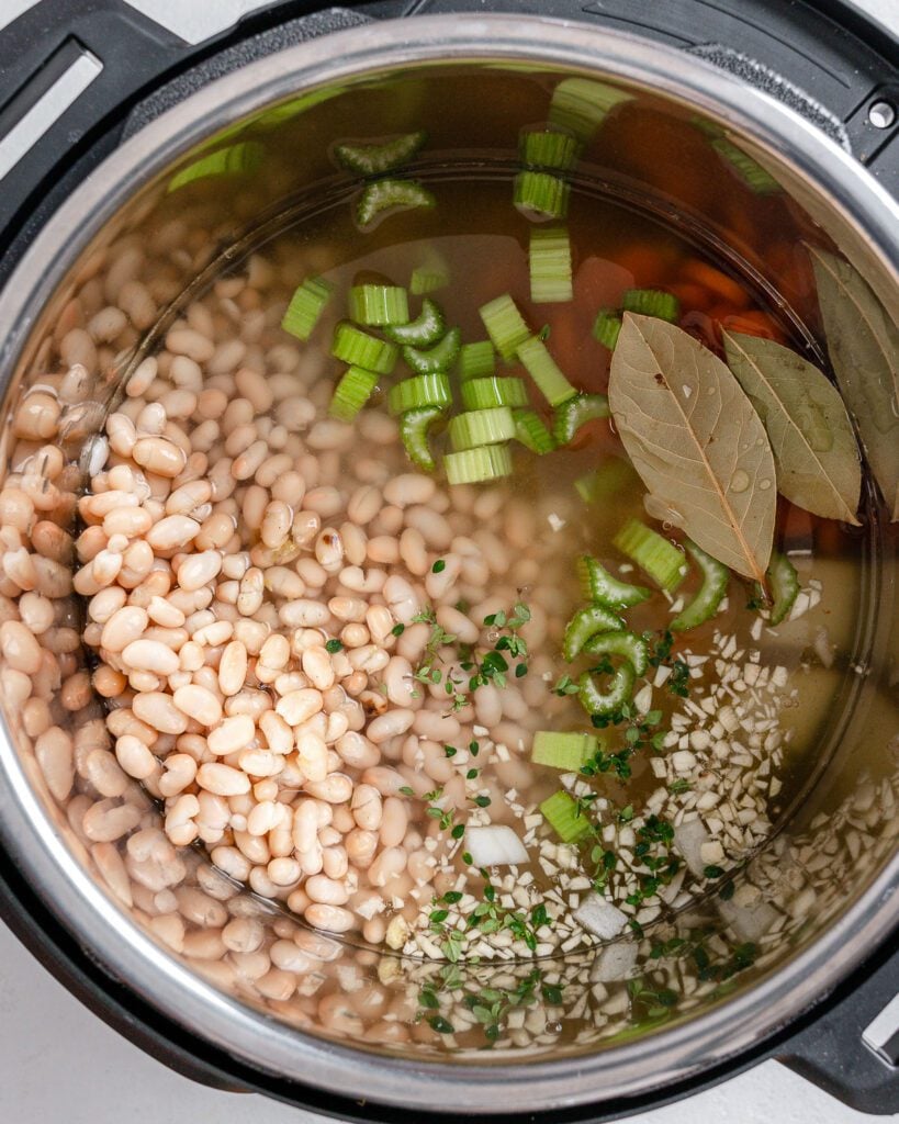 process shot of ingredients adde to instant pot bowl