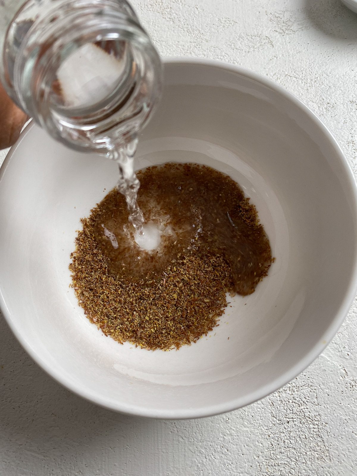 process of adding water to flaxseed