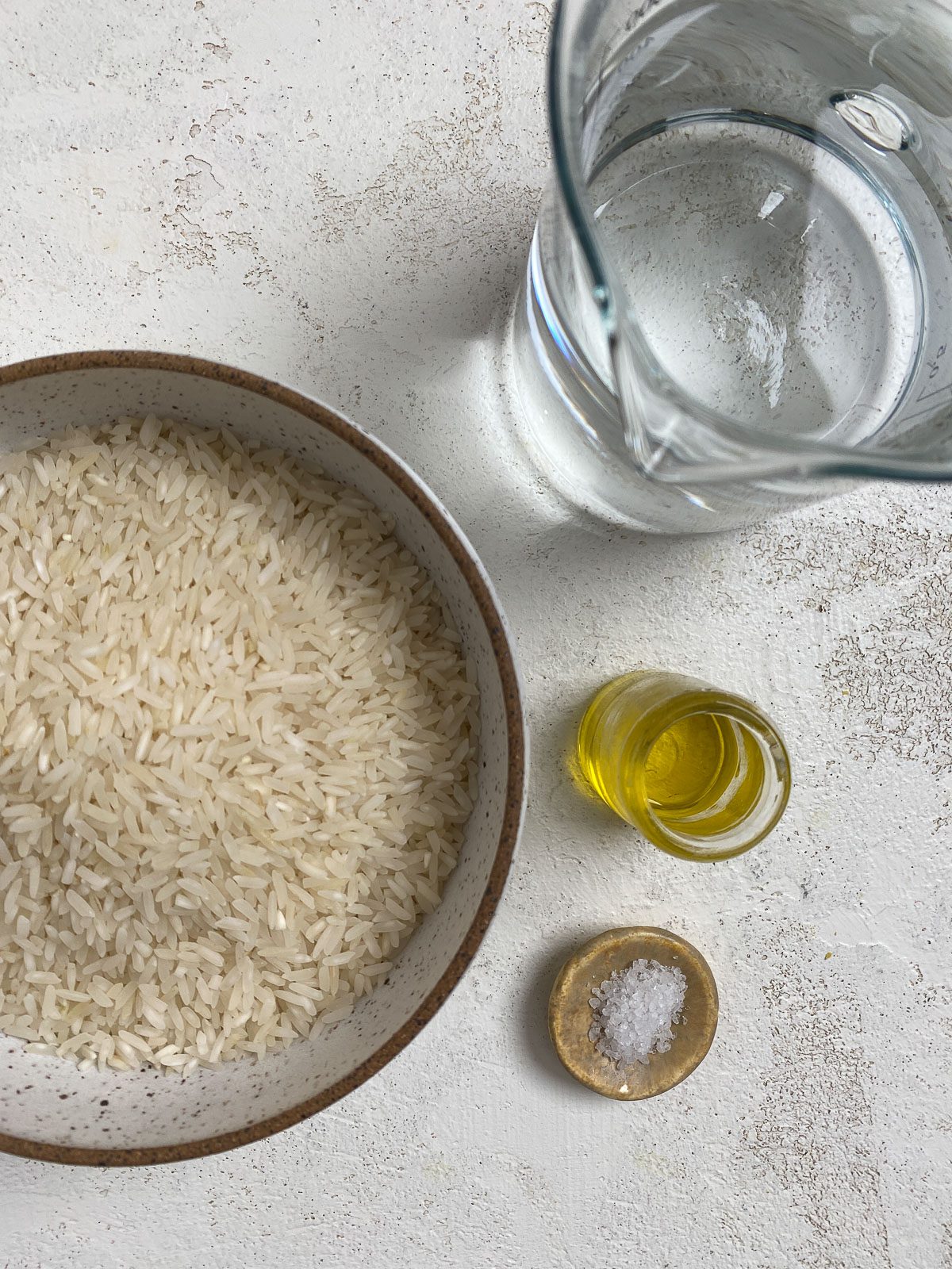 ingredients for Instant Pot Basmati Rice against a white surface