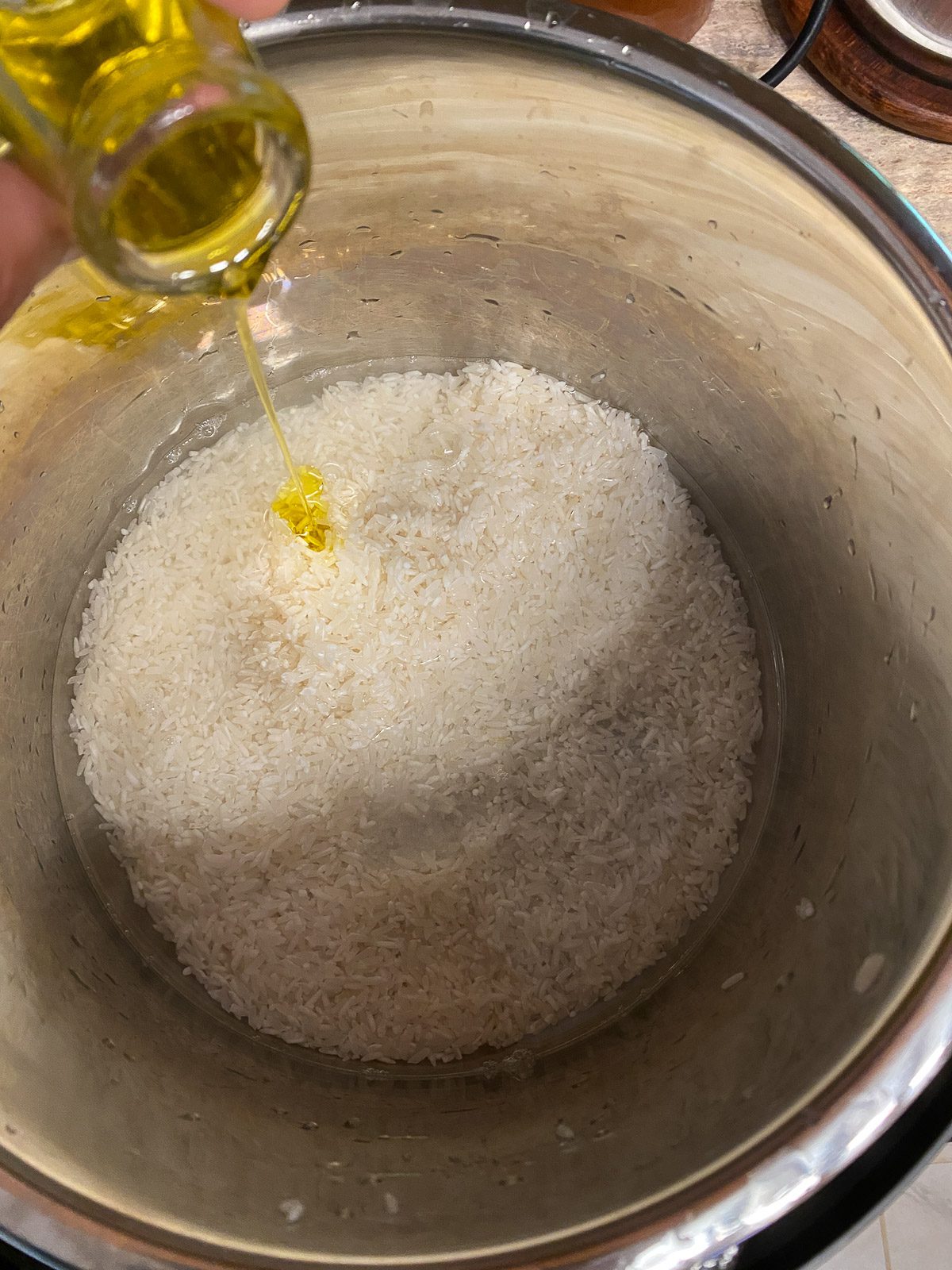 process shot of adding oil to instant pot
