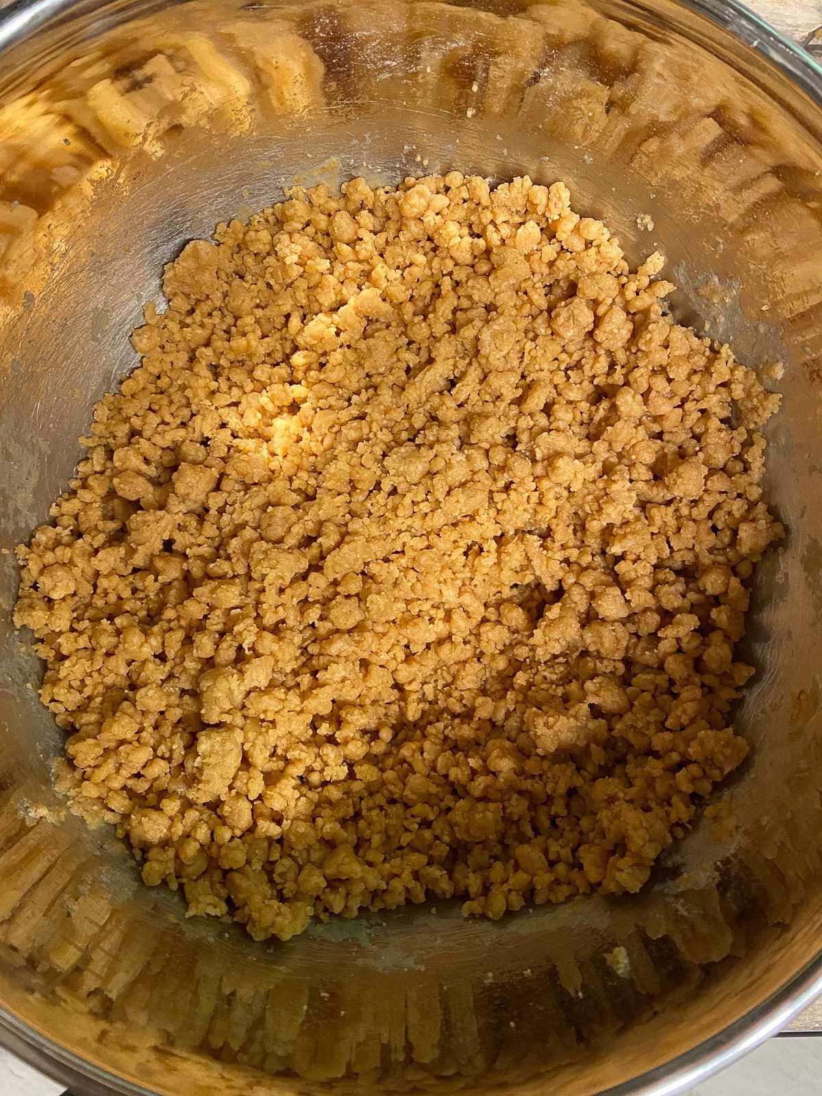 process of beating flour into mixture