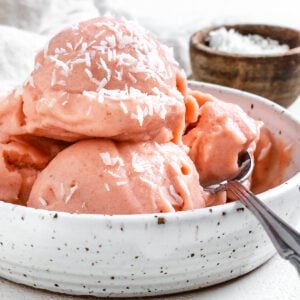 completed Pineapple Strawberry Softserve in a white bowl against a light background