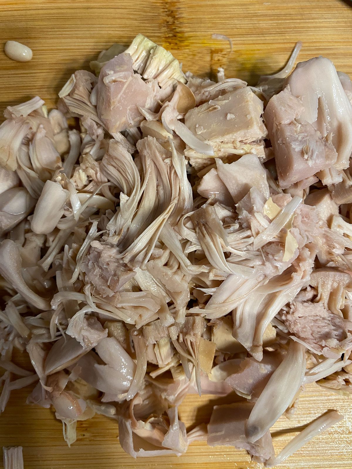 post shredding of jackfruit on cutting board