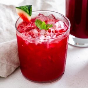 completed Fresh Watermelon Juice Blend in a glass cut with another cup in the background