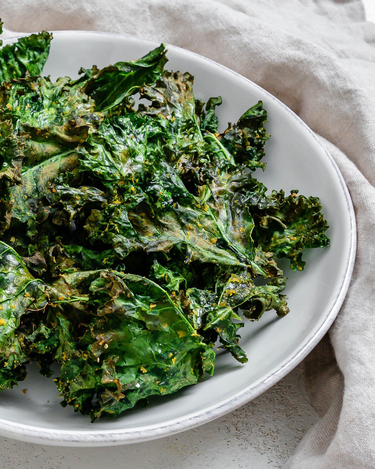 completed Air Fryer Kale Chips in a white bowl