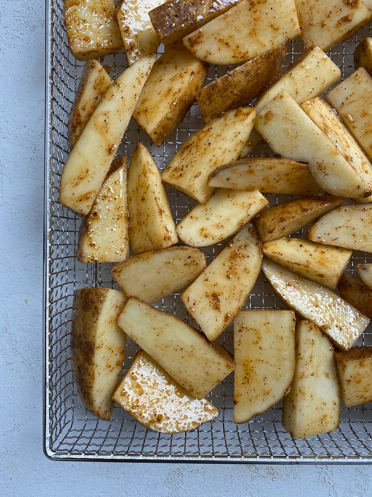 post air frying potato wedges on air fryer rack