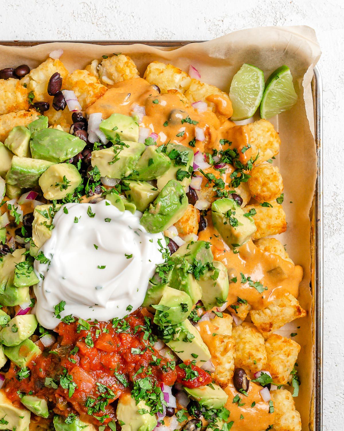 completed Totchos on a tray against a white surface
