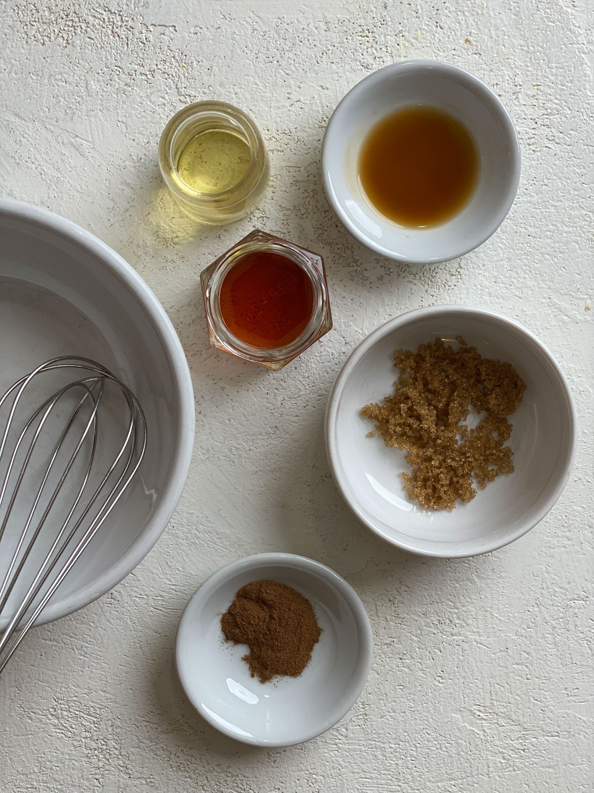 ingredients for Air Fryer Apples measured out against a white surface