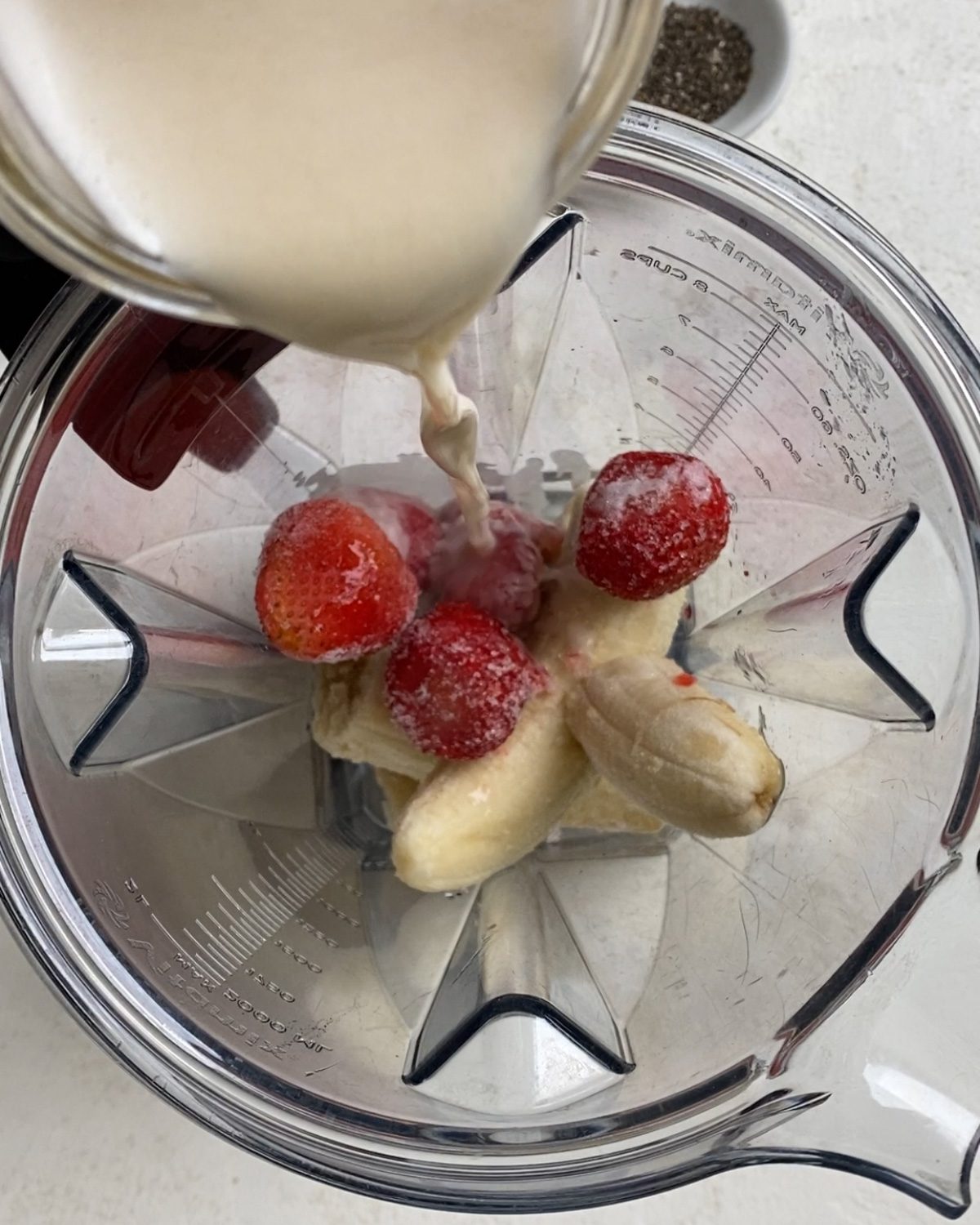 process of adding plant0basd milk to blender