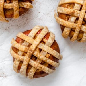completed Vegan Apple Pie Baked Apples on a white surface