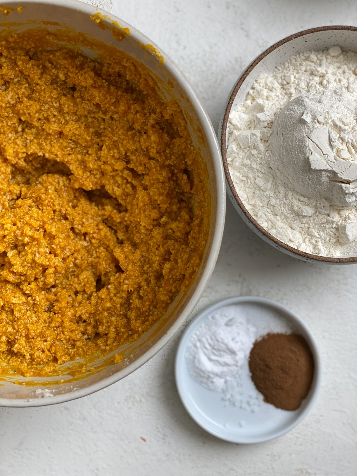 dough mixture alongside spices and flour