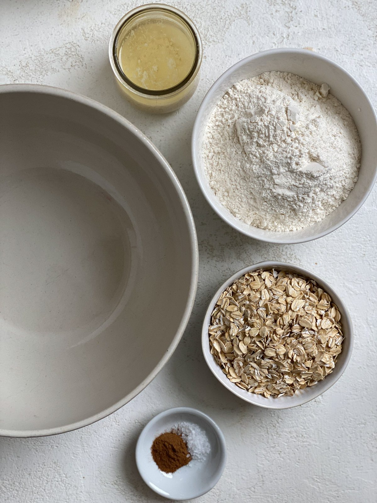 ingredients for Vegan Peach Crisp measured out in individual bowls