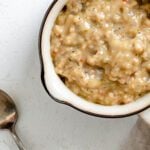 completed Vegan Sausage Gravy in a white bowl against a white surface
