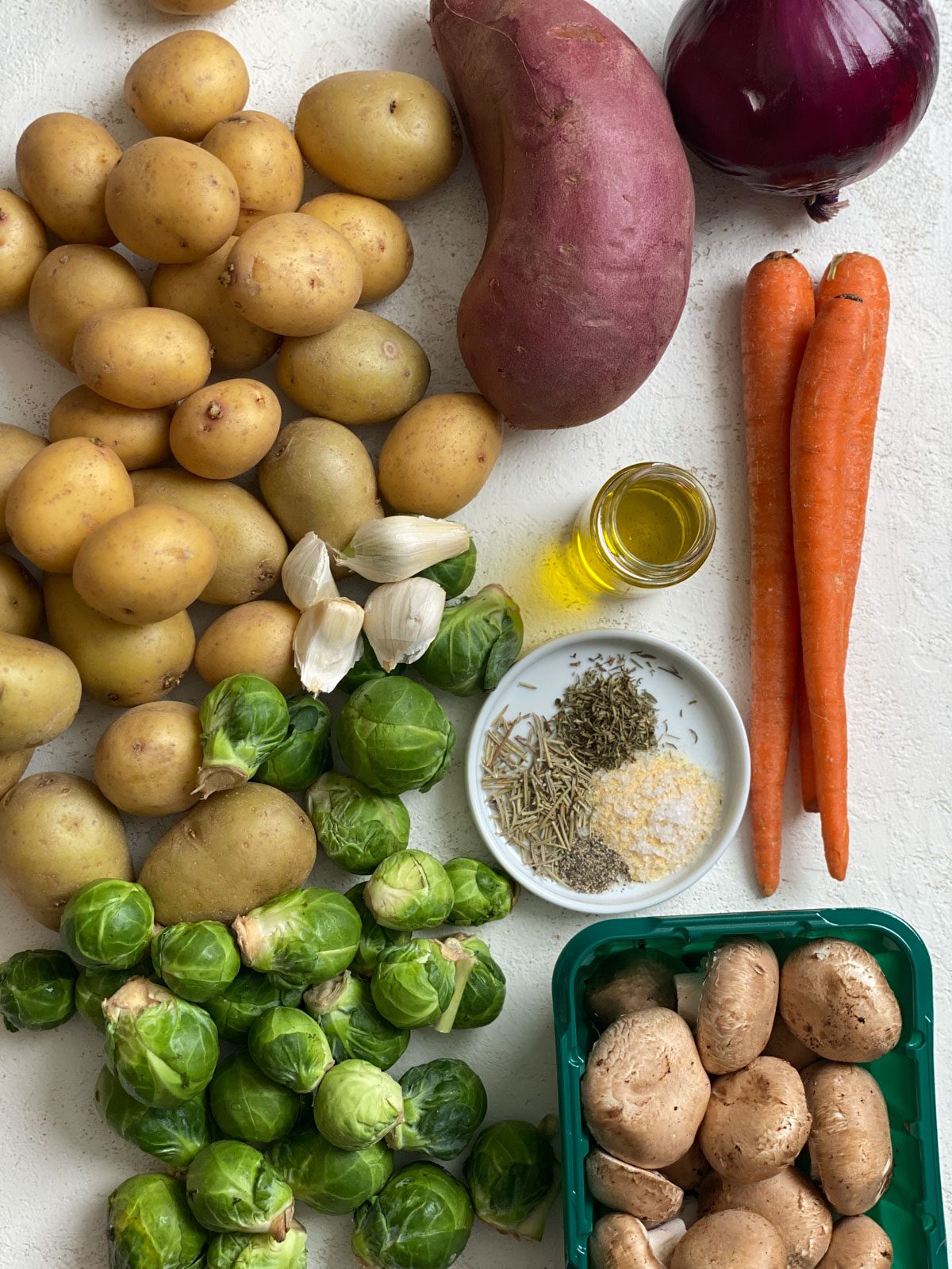 ingredients for Roasted Vegetables against a light surface