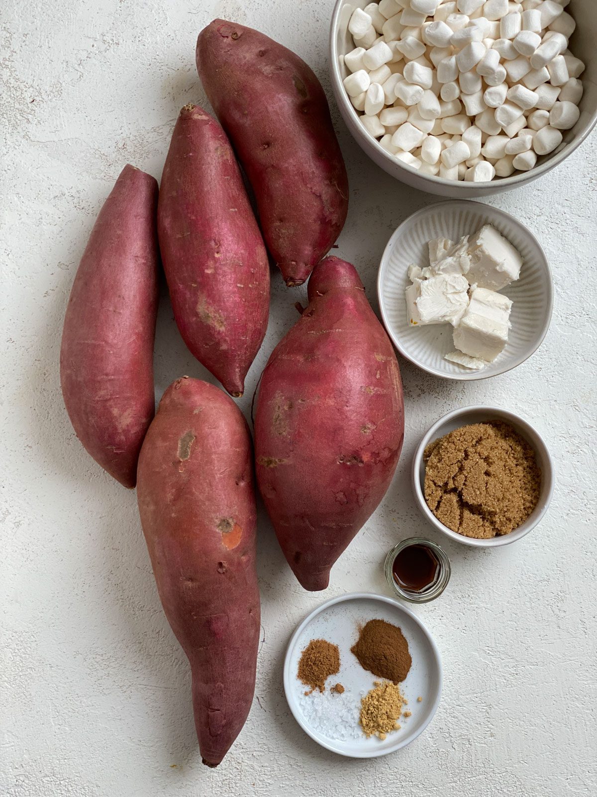 ingredients for Vegan Candied Yams with Marshmallows against a whtie surface