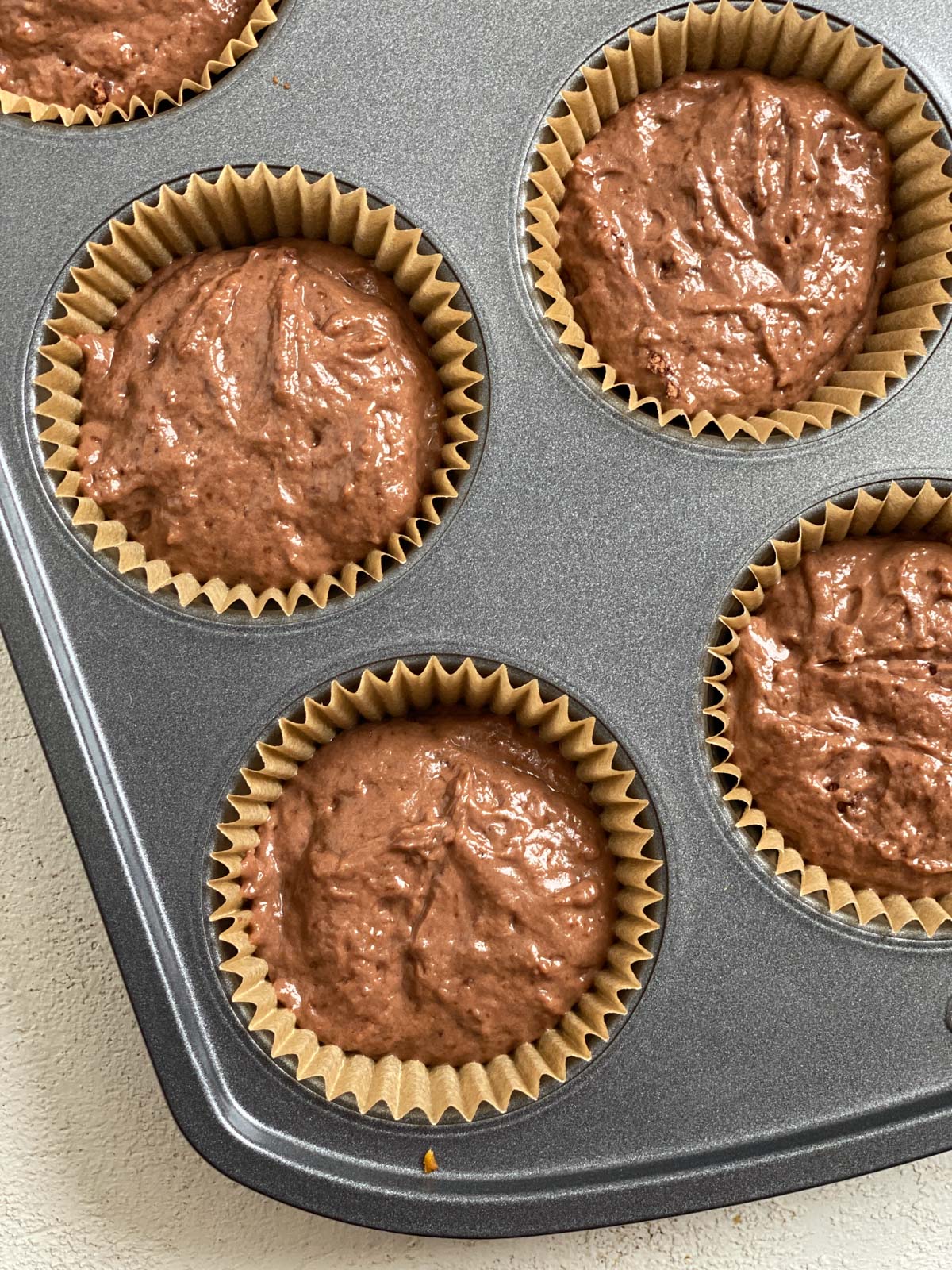 process shot post adding batter to muffin tin