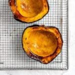 completed Easy Air Fryer Acorn Squash on a wire rack