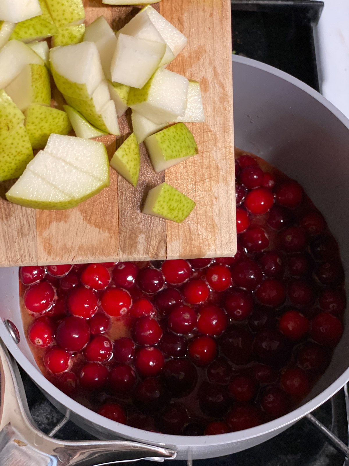 process shot of adding pears to pan