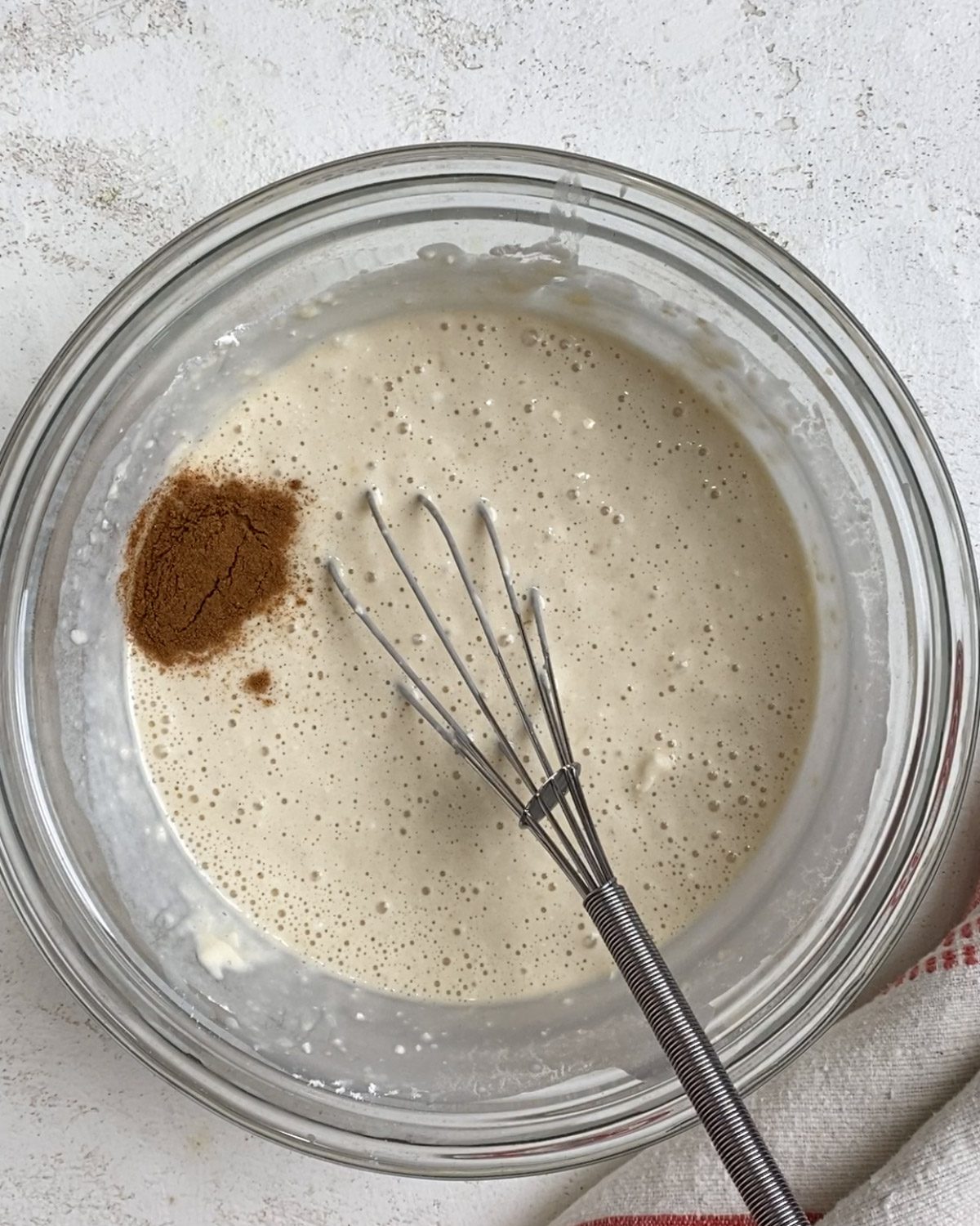 process of mixing ingredients together in bowl