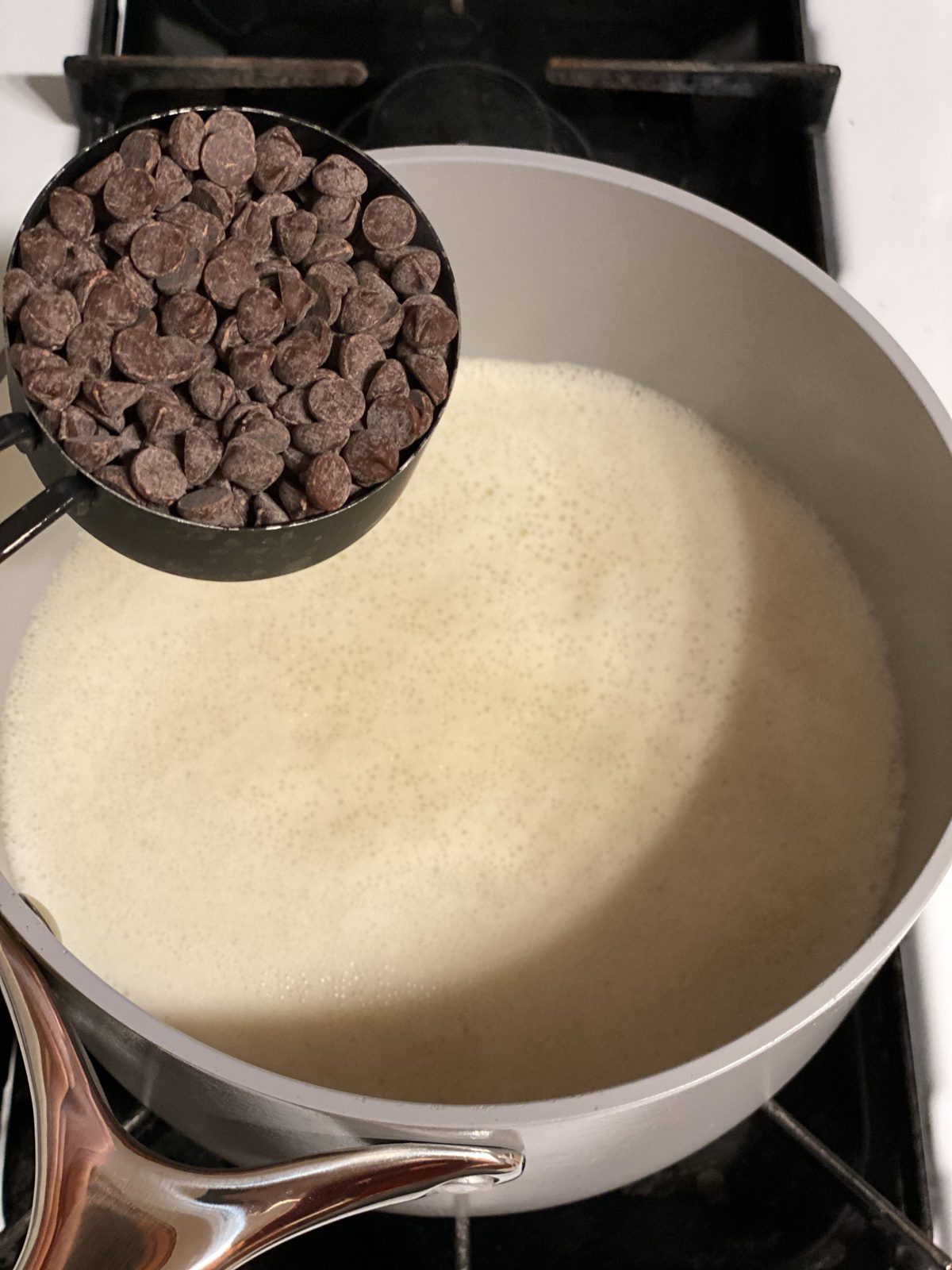 process shot of pouring chocolate to pan