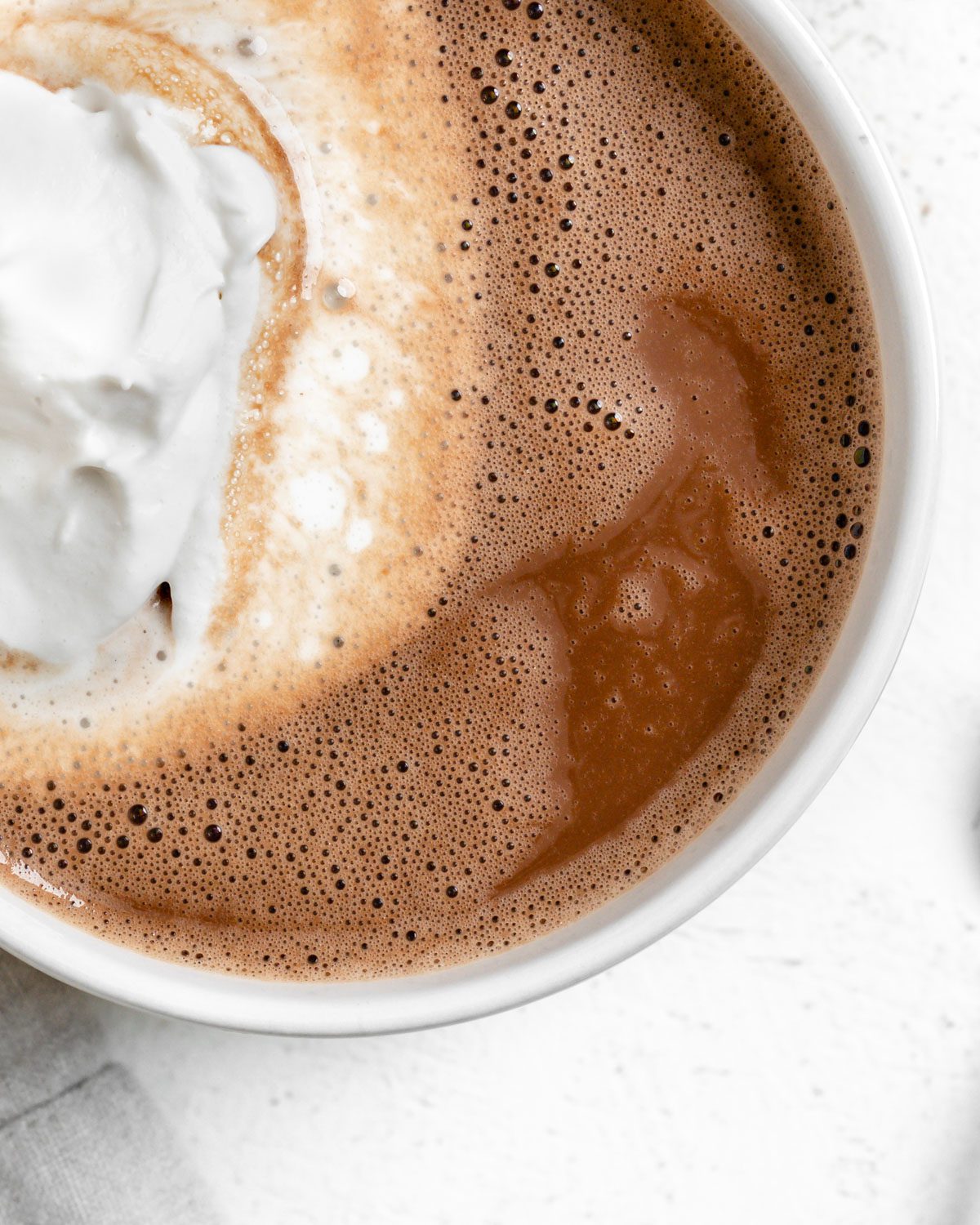 completed Dairy-Free Peppermint Hot Chocolate in a white mug against a light surface