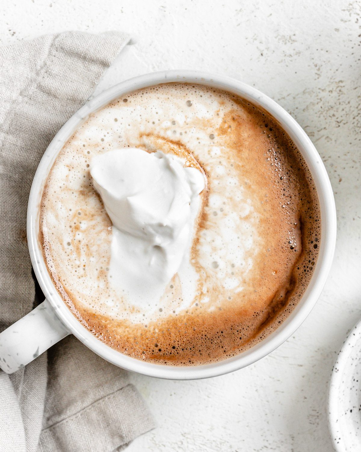 completed Dairy-Free Peppermint Hot Chocolate in a white mug against a light surface