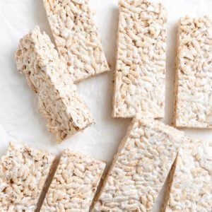 completed Easy Vegan Rice Krispie Treats scattered on a white surface