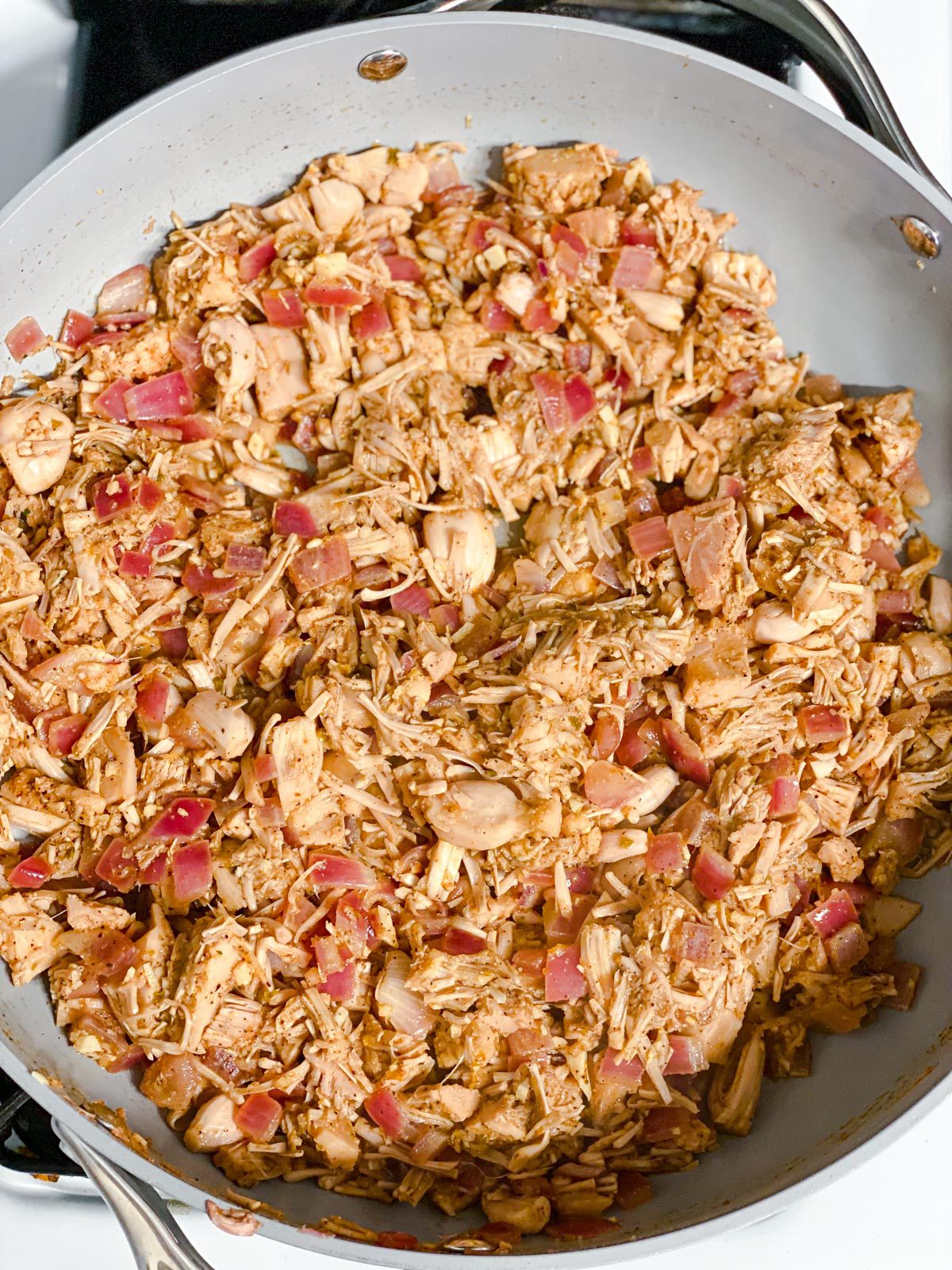 process of mixing ingredients together in a pan
