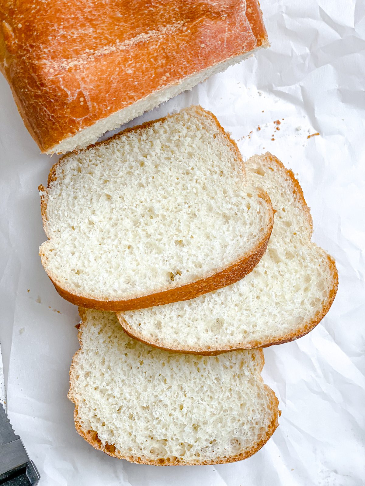sliced rhodes bread against white surface
