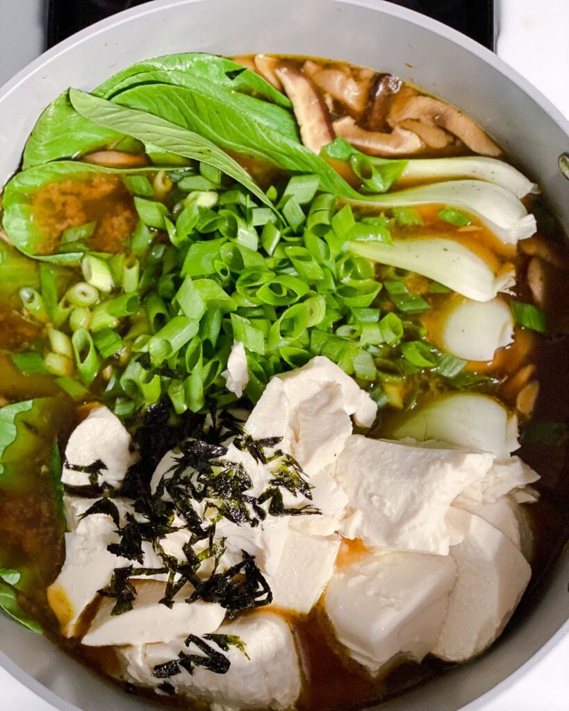 process shot of mixing ingredients together in a bot