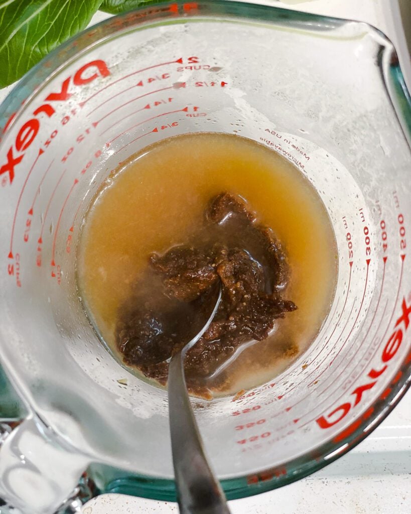 process shot of mixing miso paste in bowl