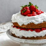 completed Vegan Strawberry Shortcake on a cake stand