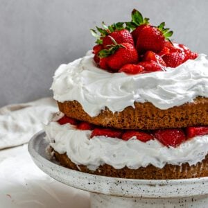 completed Vegan Strawberry Shortcake on a cake stand