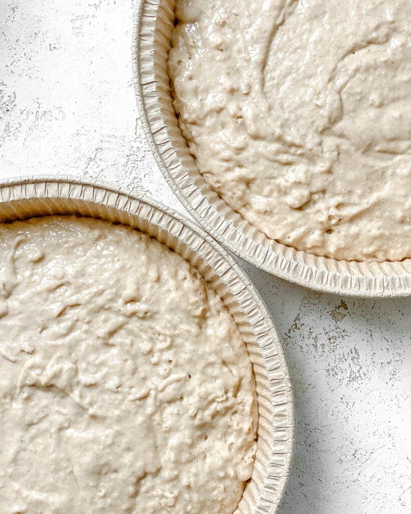 two bowls of batter alongside each other against a white surface