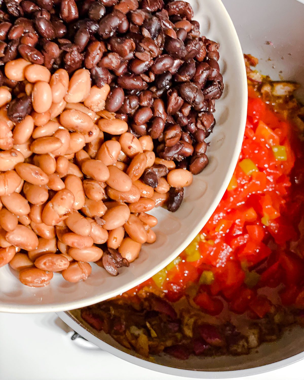 process shot of adding beans to pan