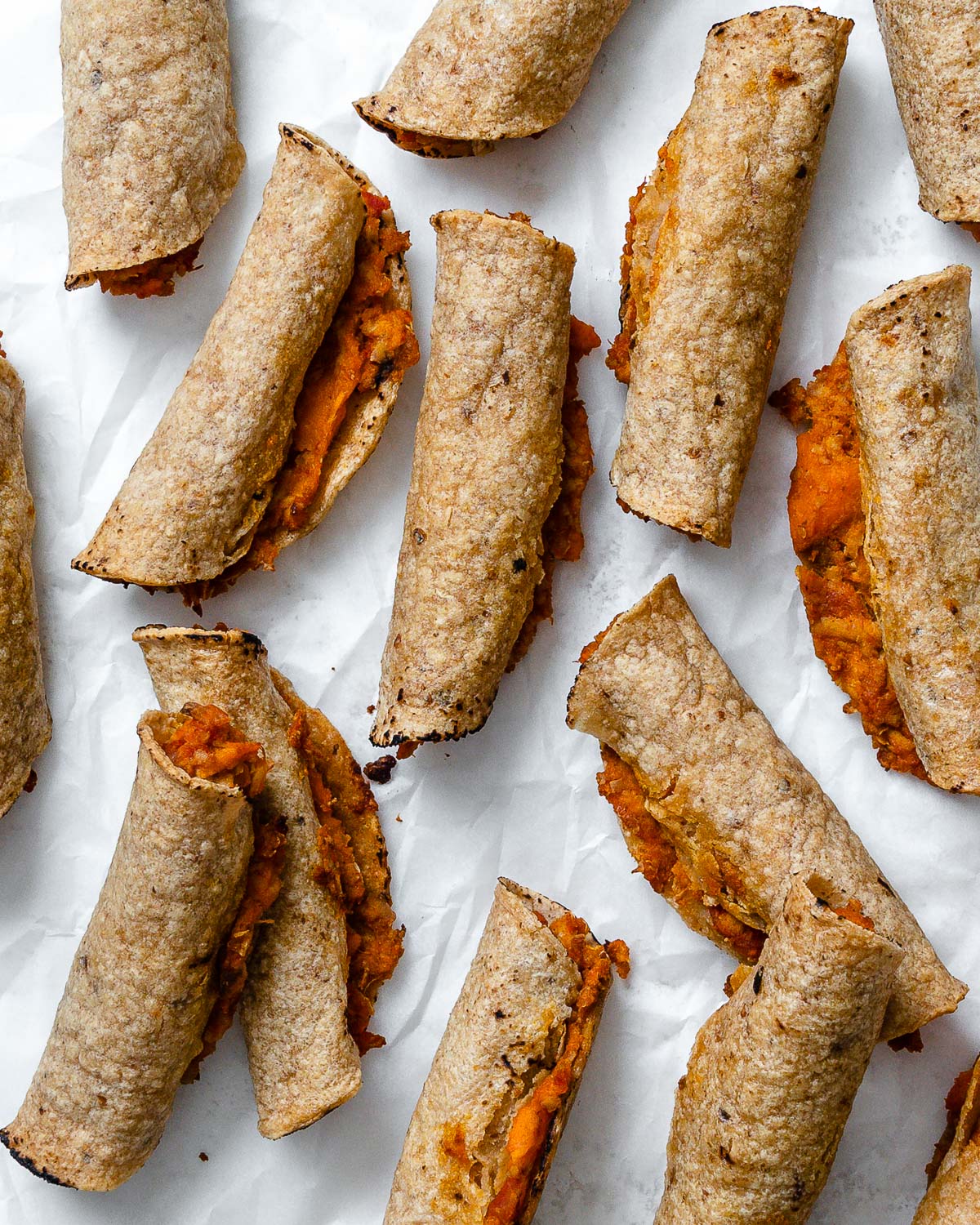 completed Vegan Taquitos against a white surface