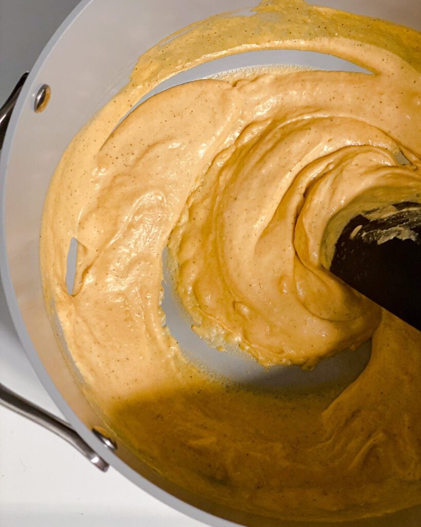 process shot of stirring ingredients in pan