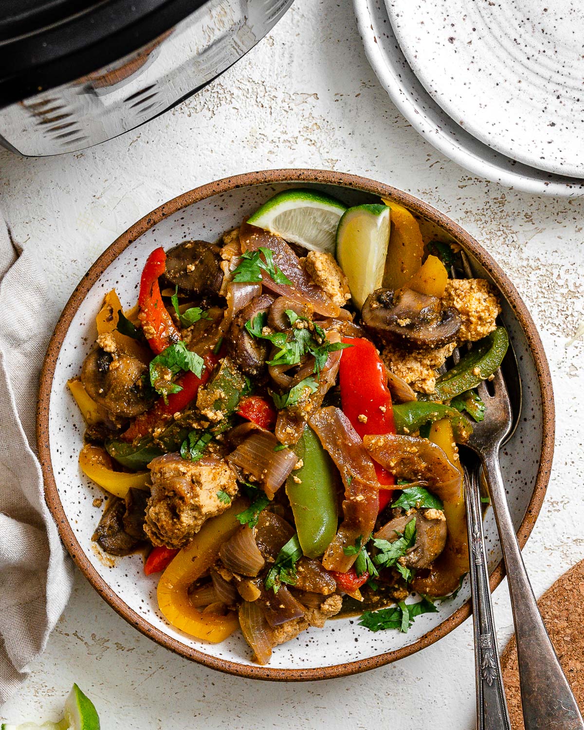completed Instant Pot Fajita Vegetables against a white surface