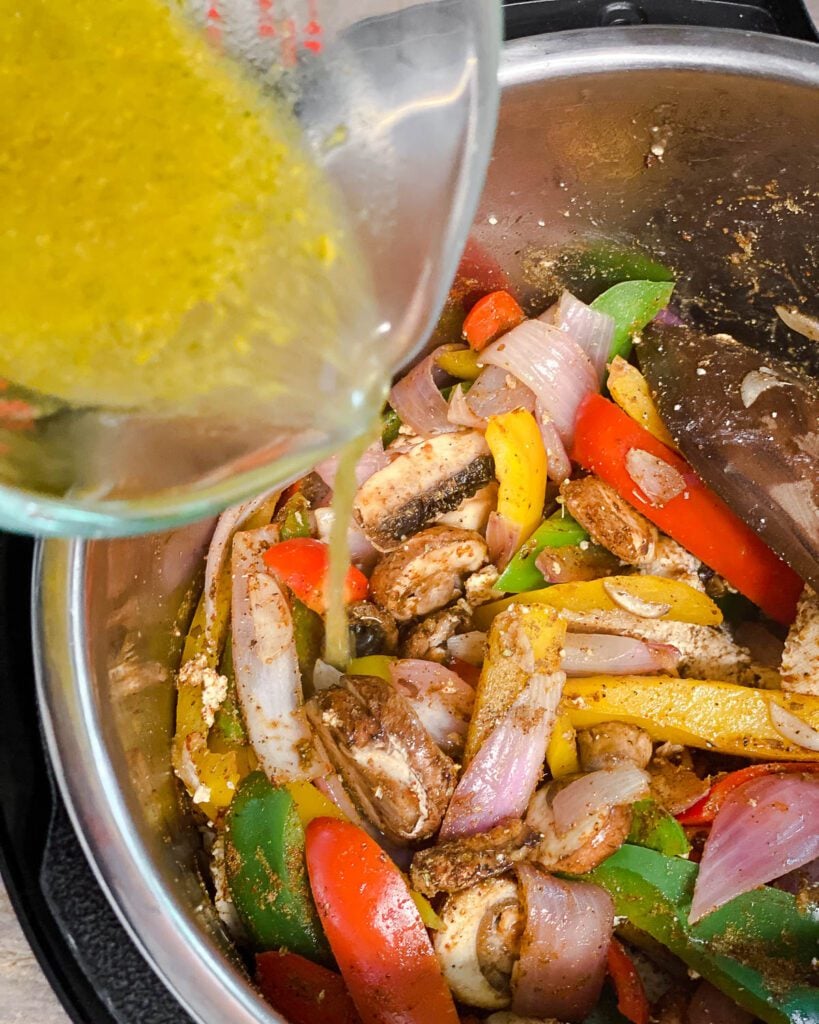 process shot of adding veggie broth to pot