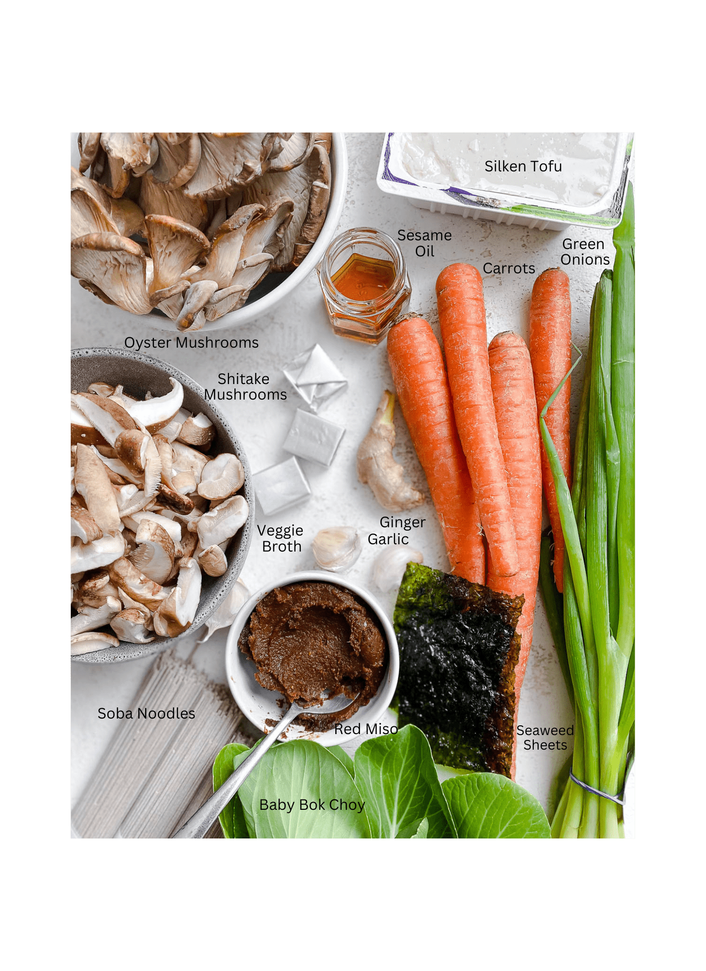 ingredients for Mushroom Miso Soup measured out against a white surface