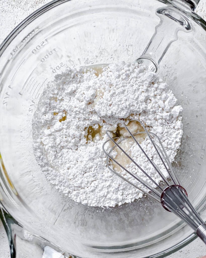 process shot of whisking ingredients together