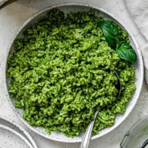 completed pesto rice against a light surface
