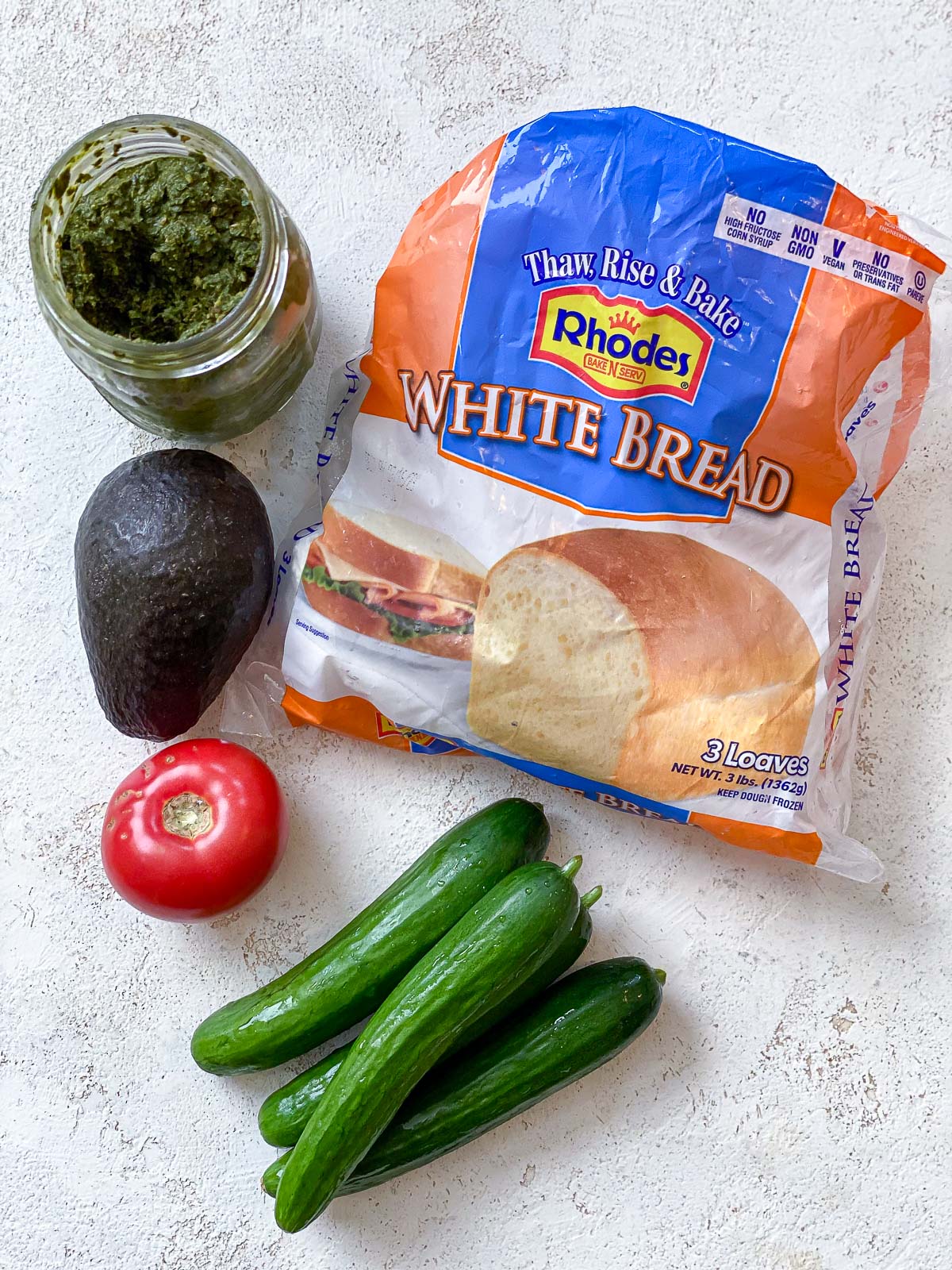 ingredients for Vegan Tea Sandwiches spread out against a white surface