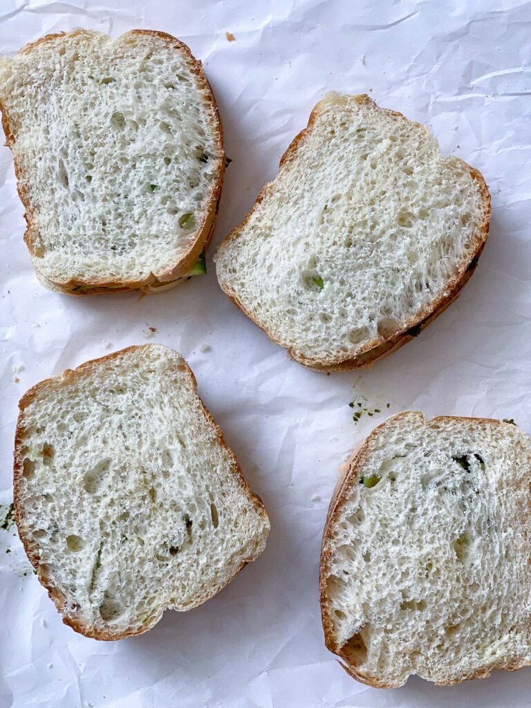 process shot showing addition of top piece of bread added to sandwich