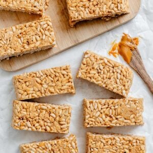 several completed Peanut Butter Rice Krispie Treats against a white surface
