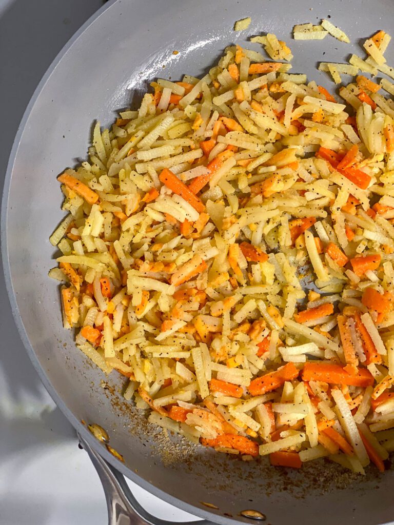 veggies cooking in pan