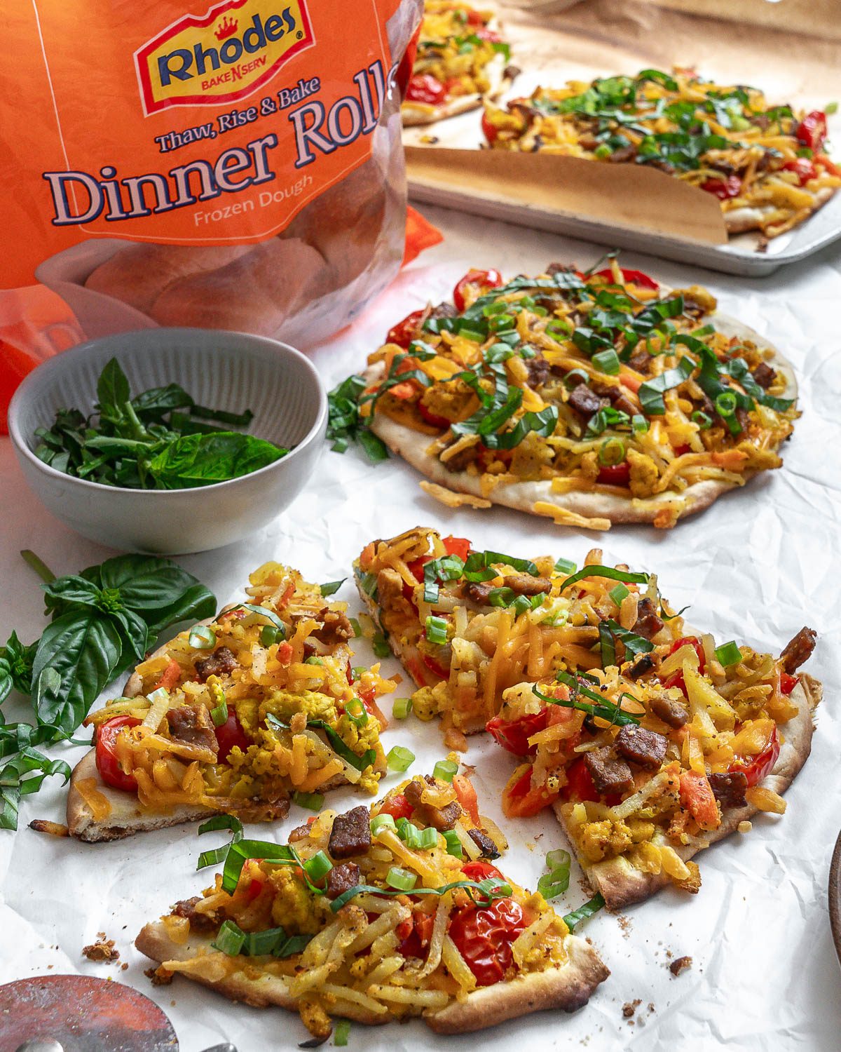 completed vegan breakfast pizza against a white surface