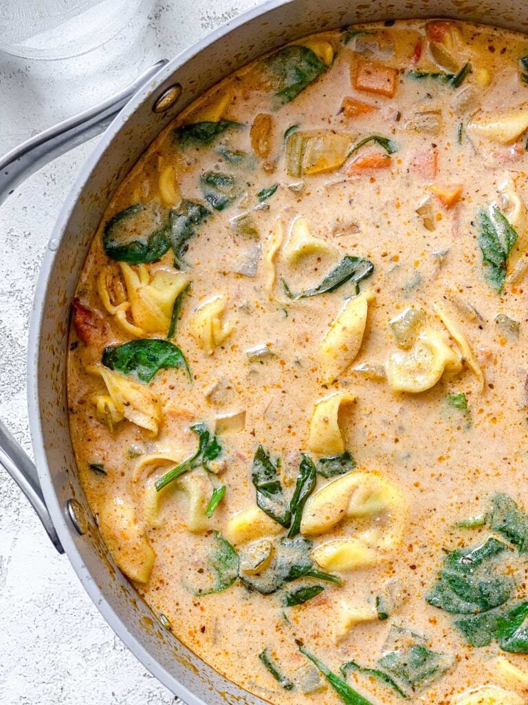 process shot of Vegan Tortellini Soup cooking in pot