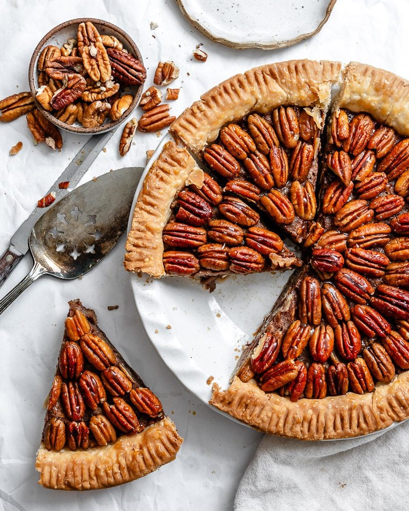 completed Vegan Pecan Pie (No Corn Syrup!) on white surface