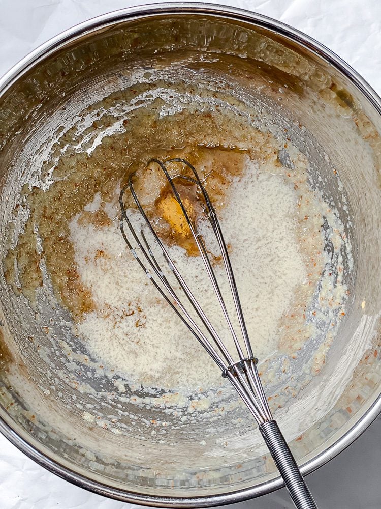 process shot of mixing ingredients in a bowl